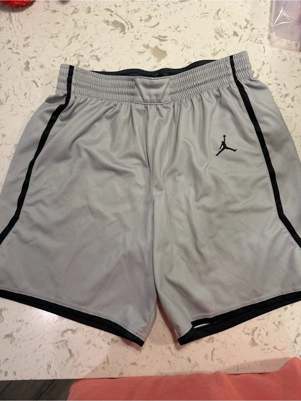 Jordan Light Gray Athletic Shorts with Black Trim